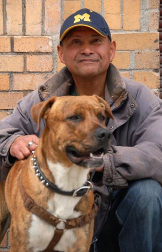 SOS recently secured permanent, affordable housing in San Francisco for client, Alvaro, and constant canine comp-anion, Max. SOS also connected Alvaro with SFCCC member clinics for geriatric and dental care, while VET SOS provided free veterinary services to Max and coordinated his service animal licensing. After spending the last 20 years without a regular roof over his head, Alvaro can now be seen looking for furniture and artwork to decorate their new home. (Photo credit: Marlena Hartman-Filson)