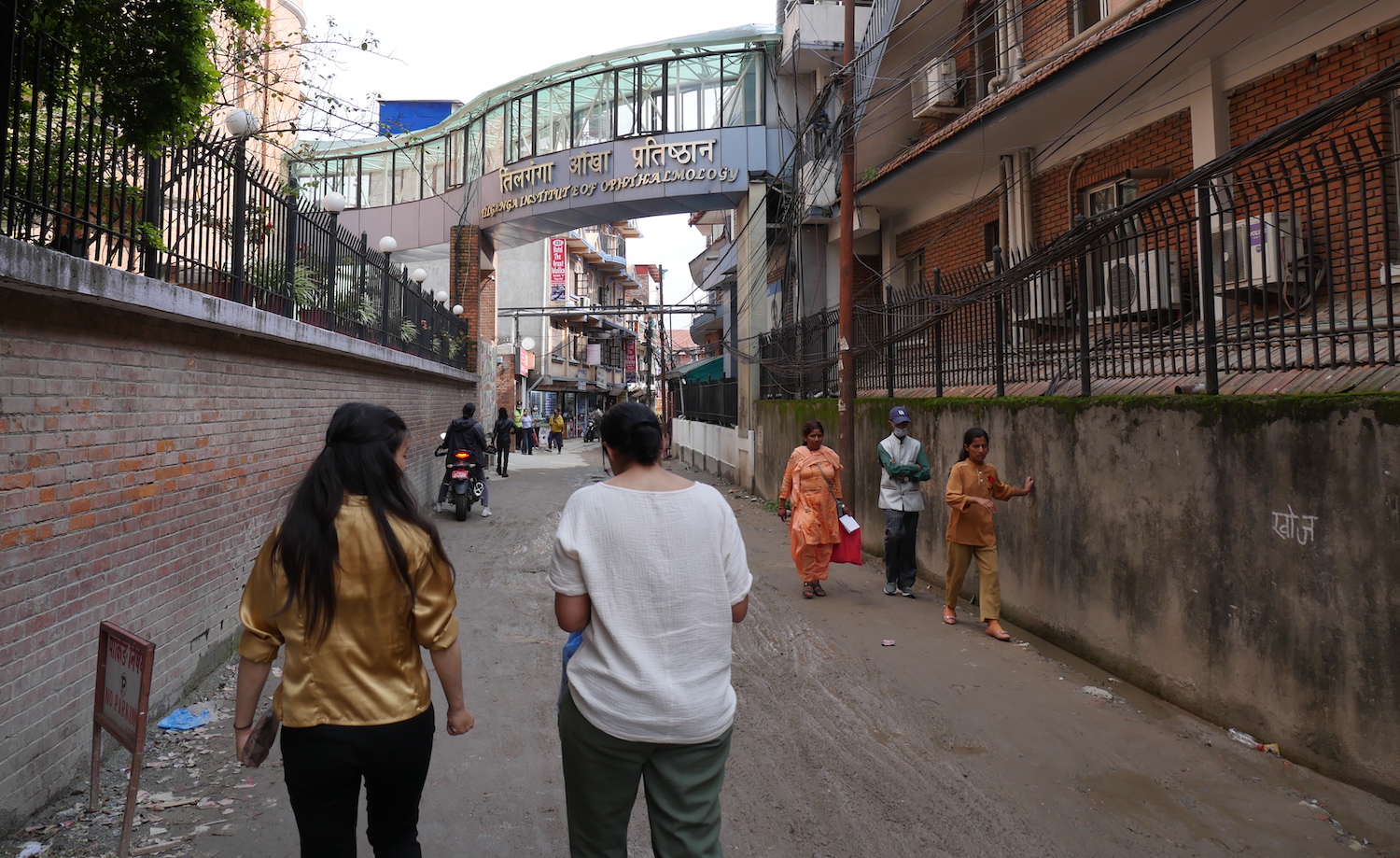 Madeline Yung, MD and Neeti Parikh, MD outside the Tilganga Institute of Ophthalmology in Kathmandu, Nepal.