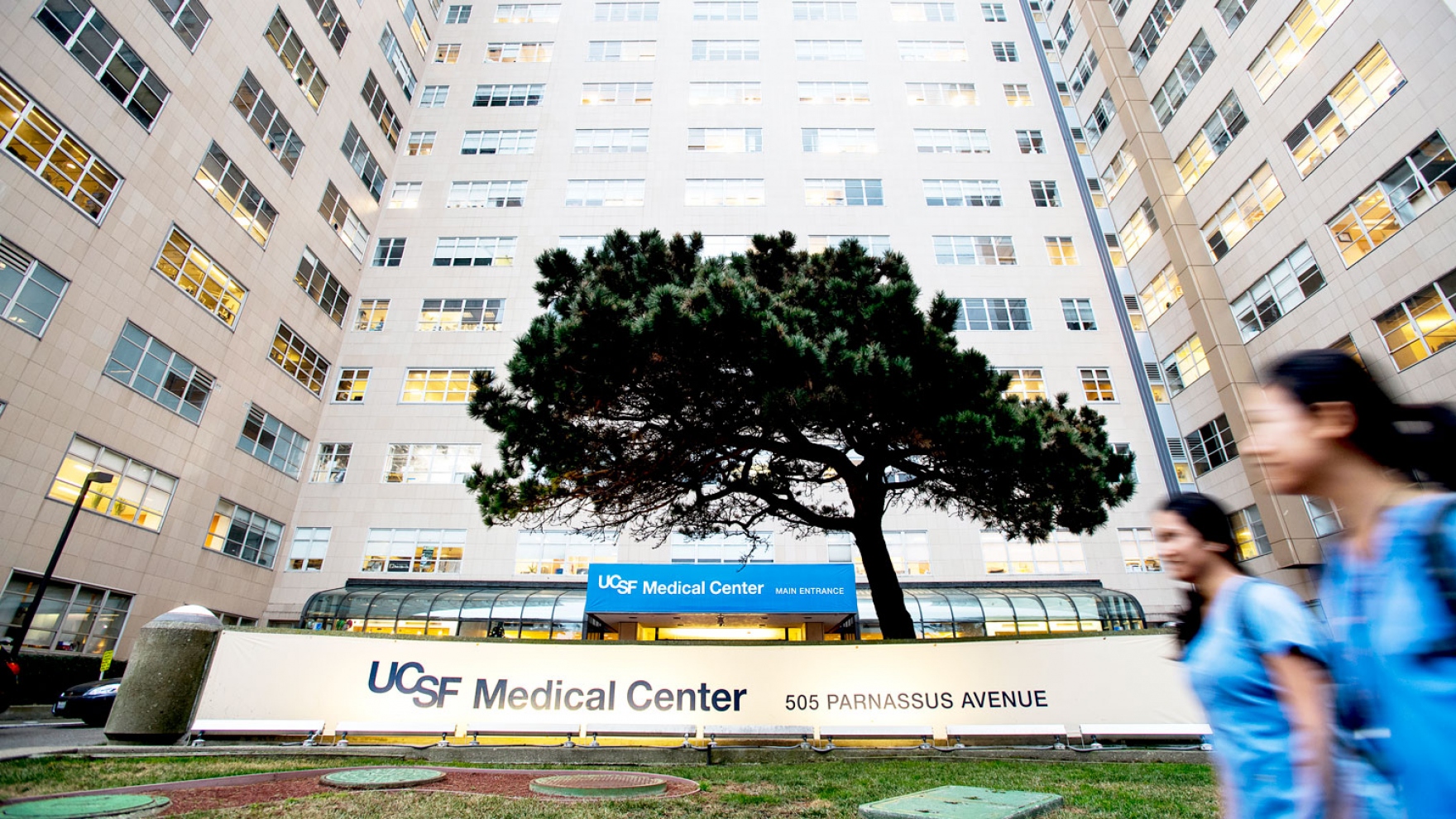 UCSF medical center exterior with clinicians