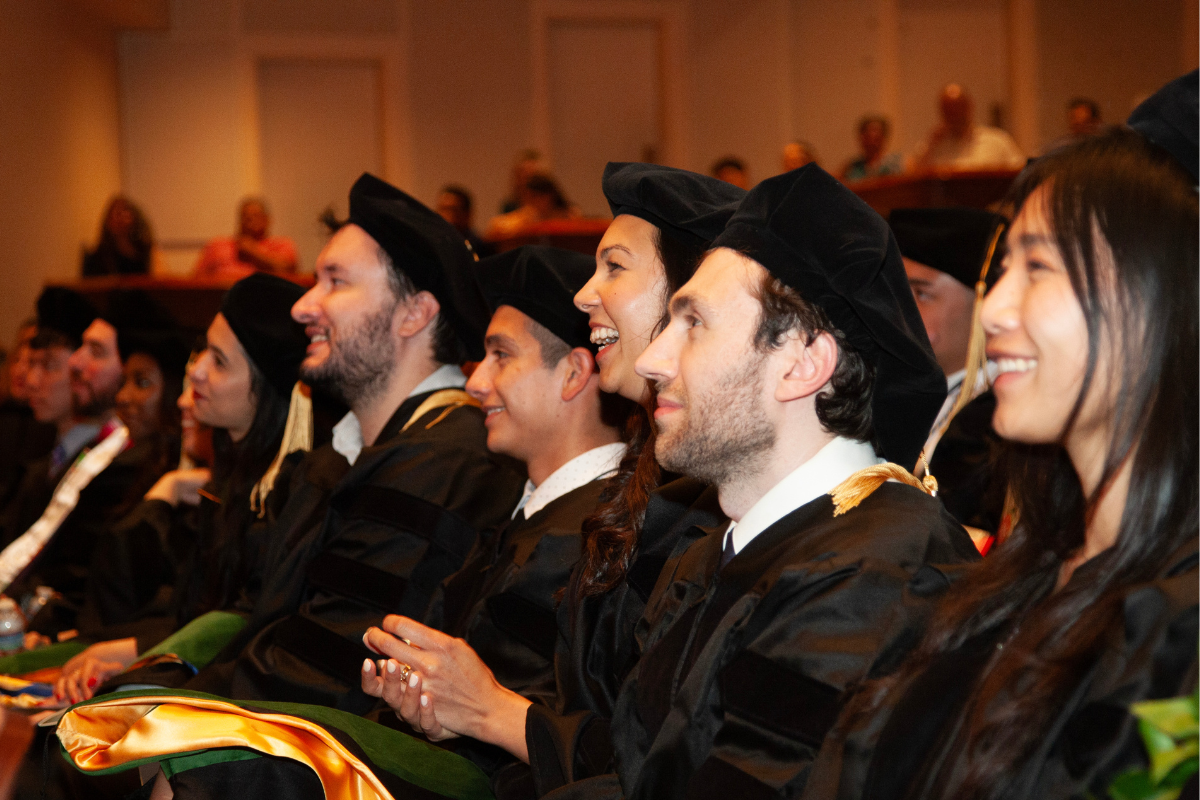 Graduates seated in a row