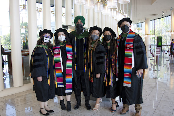 A group of students pose for a photo before the ceremony