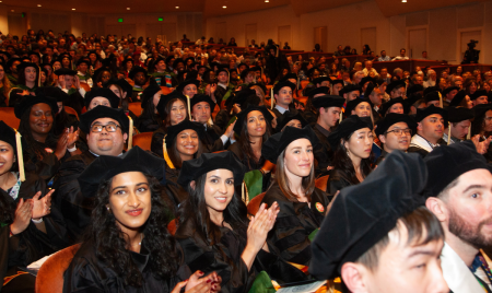 UCSF medical students wearing graduation gowns