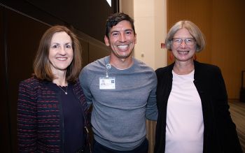 photo of three people standing together