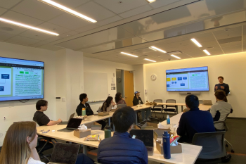 Ben Hyams, MS2, presents his research, “Large Language Models (LLMs) for Acute Hospitalization Risk Prediction During Radiation Therapy,” during the 2024 Summer Explore Symposium in December 2024